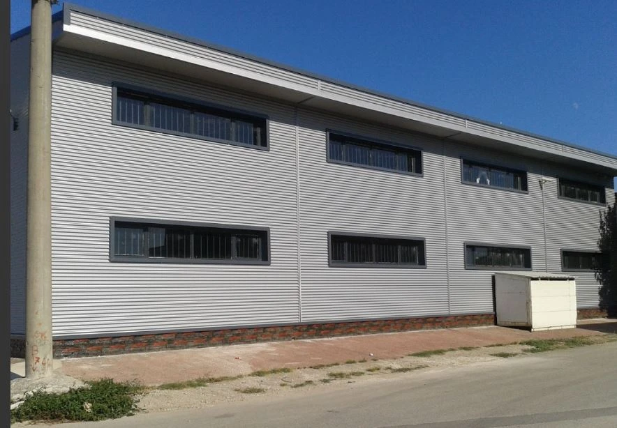 Sinüs sac kaplamalı endüstriyel yapı cephesi
